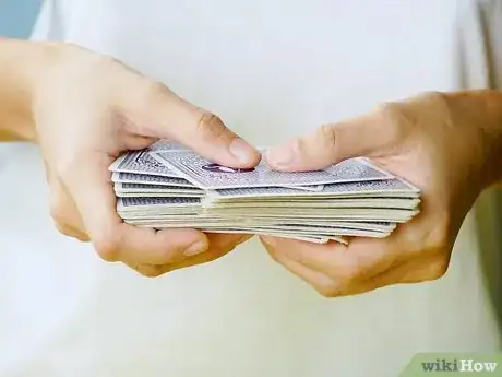 Image titled Riffle and Bridge Shuffle Step 12