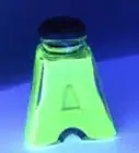 Make Glowing Bottles for a Blacklight