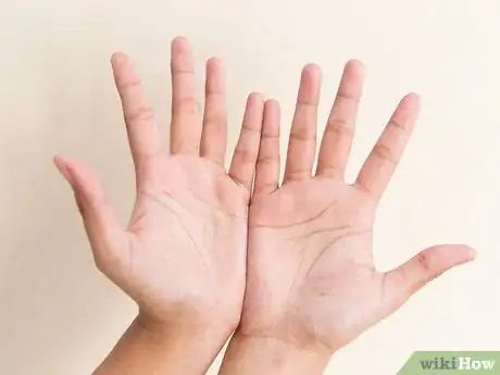 Imagen titulada Do a Snake Hand Trick Step 11