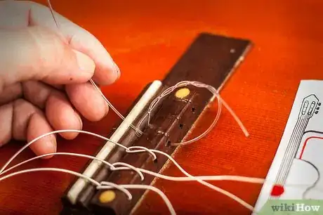 Imagen titulada Change Classical Guitar Strings Step 4Bullet3