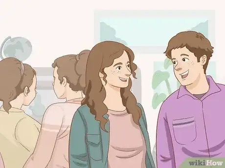 Imagen titulada Get a Guy to Notice You Without Talking to Him at School Step 12