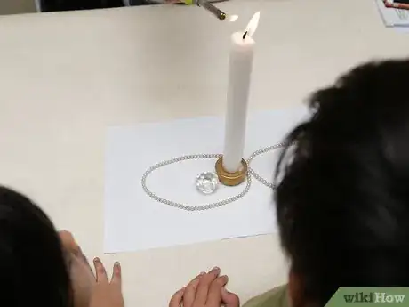 Imagen titulada Light a Candle Without Touching the Wick Step 9