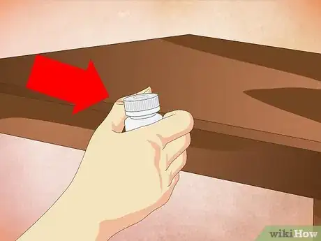Imagen titulada Open a Child Proof Pill Container Step 5
