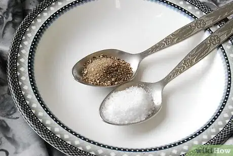 Imagen titulada Take 2 Table spoons of Salt and Pepper Step 1