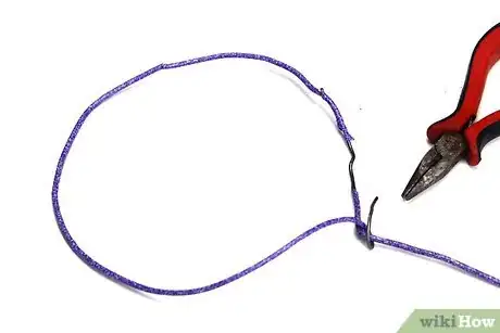 Imagen titulada Reuse Wire Hangers Step 3