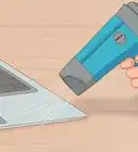 quitar pegatinas de una laptop