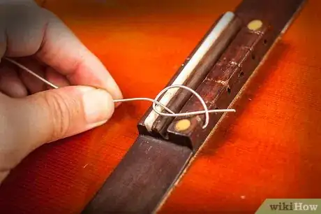 Imagen titulada Change Classical Guitar Strings Step 3Bullet4