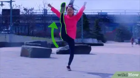 Imagen titulada Do the Pretzel Stretch Step 1