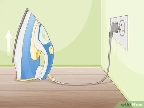 Imagen titulada Get Water Stains Off Wood Step 2