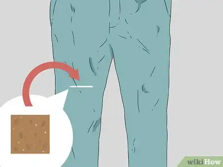 Imagen titulada Cut Knee Holes in Jeans Step 2