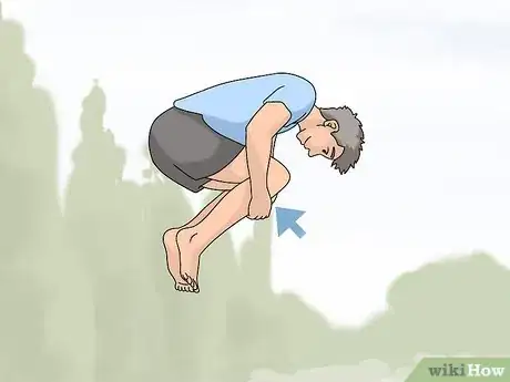 Imagen titulada Land a Front Flip on the Trampoline Step 9