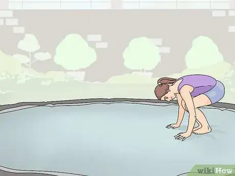 Imagen titulada Land a Front Flip on the Trampoline Step 13