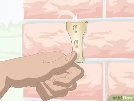 Imagen titulada Hang Christmas Lights on Brick Step 11