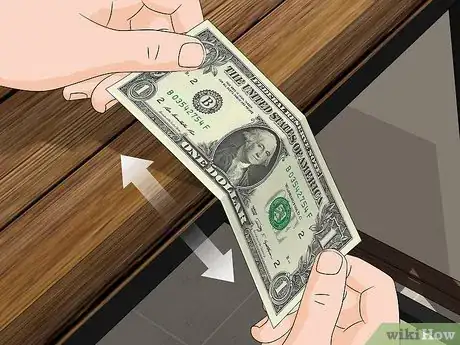 Imagen titulada Straighten Out a Dollar Bill Step 8