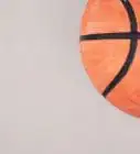 inflar un balón de baloncesto