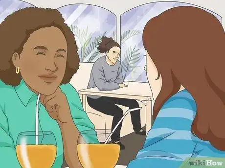 Imagen titulada Check Out a Girl Without Her Noticing Step 3