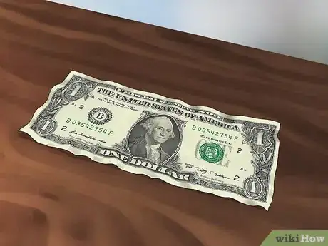 Imagen titulada Straighten Out a Dollar Bill Step 1
