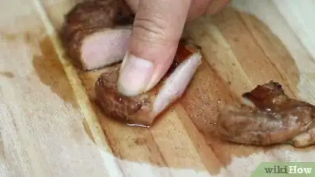 Imagen titulada Check That Pork Is Cooked Through Step 14
