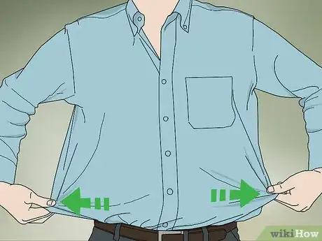 Imagen titulada Keep Dress Shirt from Riding Up Step 2