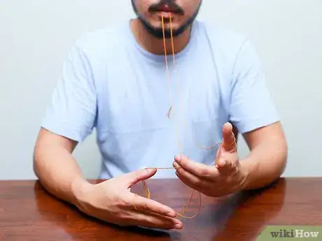 Imagen titulada Make an Eiffel Tower With String Step 13
