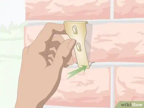 Imagen titulada Hang Christmas Lights on Brick Step 10