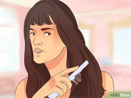 Imagen titulada Take Hair Extensions Out Step 7