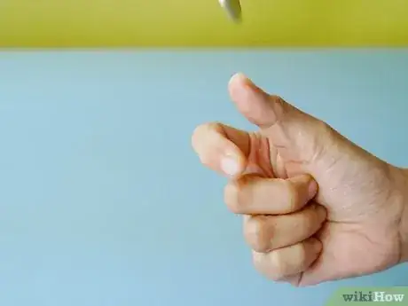 Imagen titulada Flip a Coin Step 5