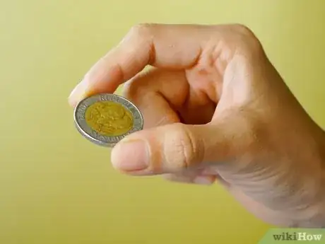 Imagen titulada Flip a Coin Step 1