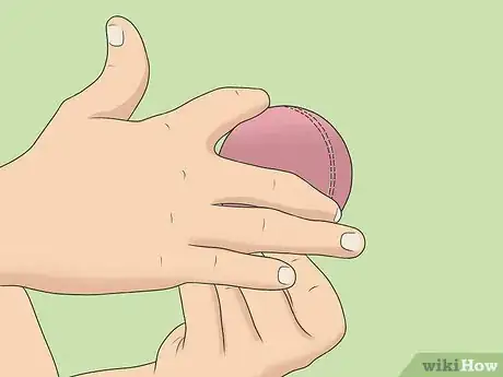 Imagen titulada Grip the Ball to Bowl Offspin Step 3