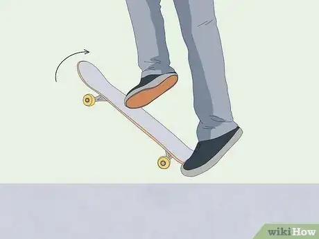 Imagen titulada 180 on a Skateboard Step 11