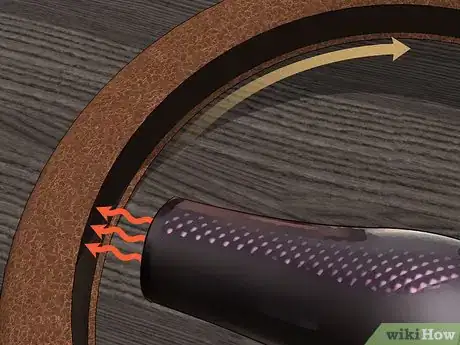 Imagen titulada Fit a Steering Wheel Cover Step 5