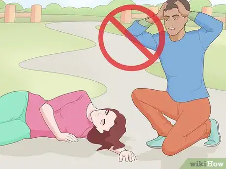 Imagen titulada Help Someone Who Is Having a Seizure Step 9