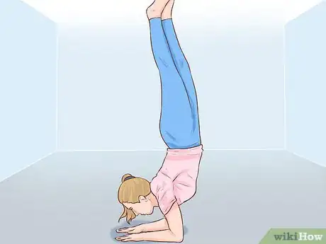 Imagen titulada Do an Elbow Stand Step 4