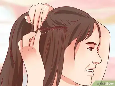 Imagen titulada Take Hair Extensions Out Step 4