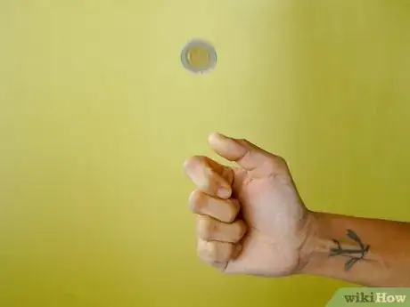 Imagen titulada Flip a Coin Step 6
