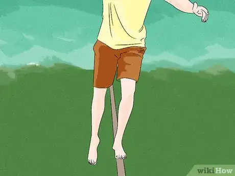 Imagen titulada Walk a Slackline Step 12