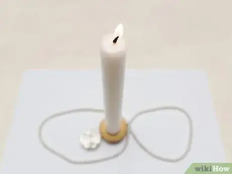 Imagen titulada Light a Candle Without Touching the Wick Step 5