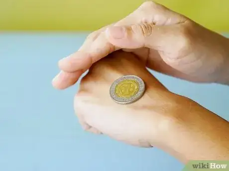 Imagen titulada Flip a Coin Step 7