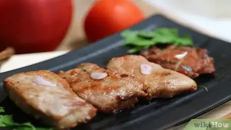 Imagen titulada Check That Pork Is Cooked Through Step 10