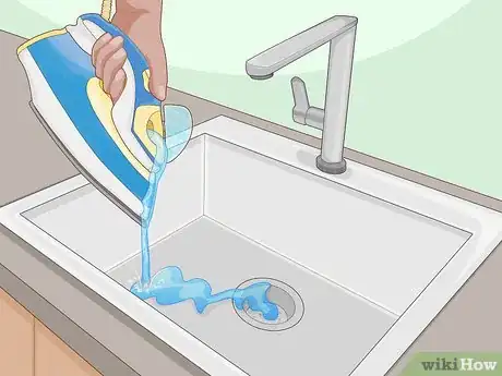 Imagen titulada Get Water Stains Off Wood Step 1
