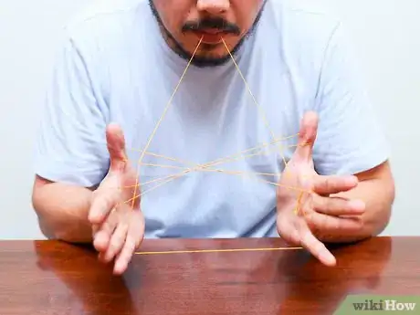 Imagen titulada Make an Eiffel Tower With String Step 8