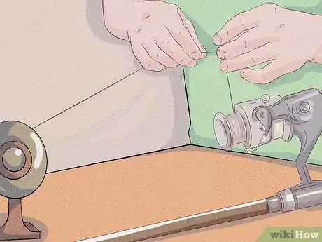 Imagen titulada Spool New Fishing Line Onto a Reel Step 29