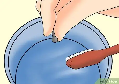 Imagen titulada Brush Your Teeth with a Tongue Piercing Step 6
