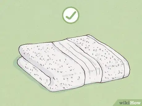 Imagen titulada Make a Body Wrap Towel After a Shower Step 2