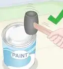 abrir una lata de pintura