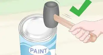 abrir una lata de pintura