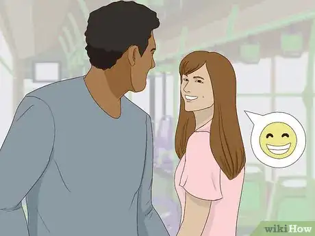Imagen titulada Start a Conversation with Someone on the Train, Bus or Subway Step 2