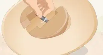 estirar sombreros o gorras
