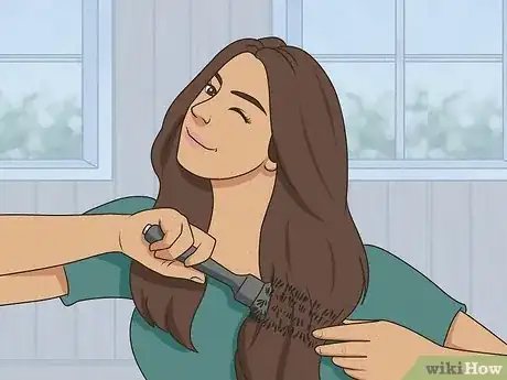 Imagen titulada Curl Hair Using a Hot Air Brush Step 12.jpeg