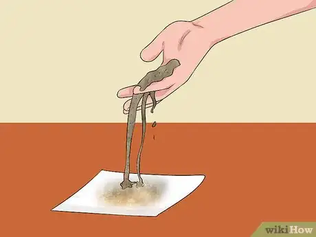 Imagen titulada Clean Up Oil Spills Step 2